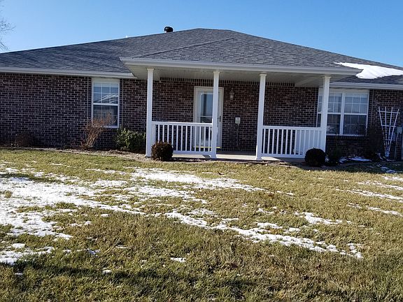 SIde view with covered porch