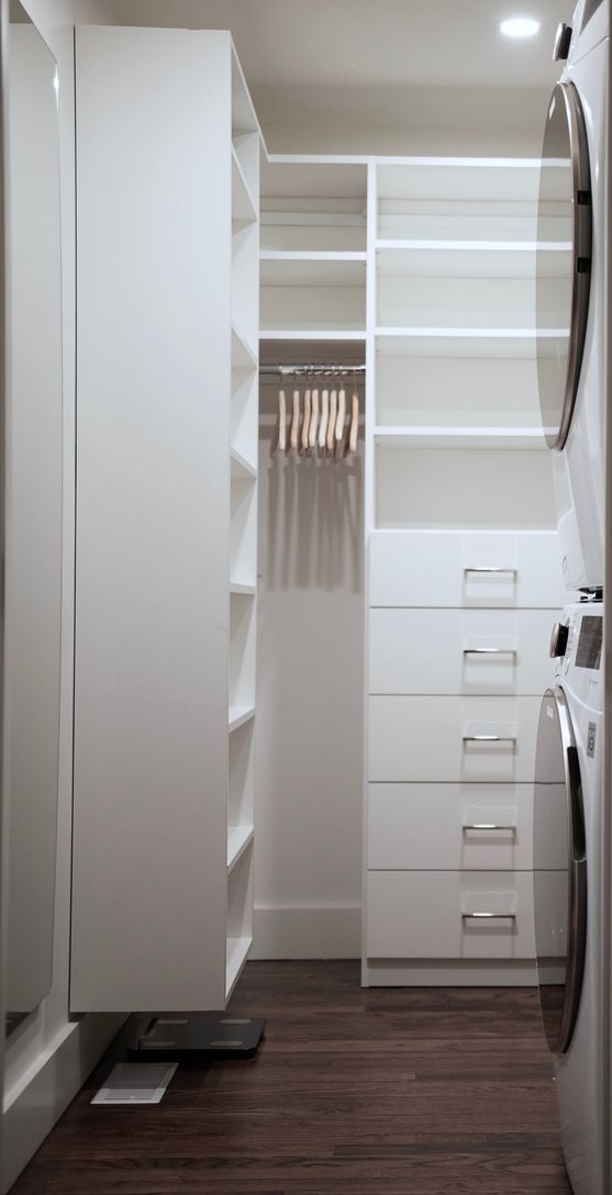  Downstairs bedroom closet with laundry