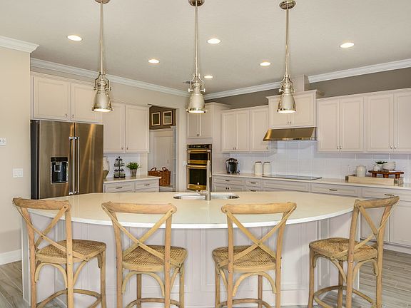 Gather Around Your Kitchen Island in a New Pulte Home