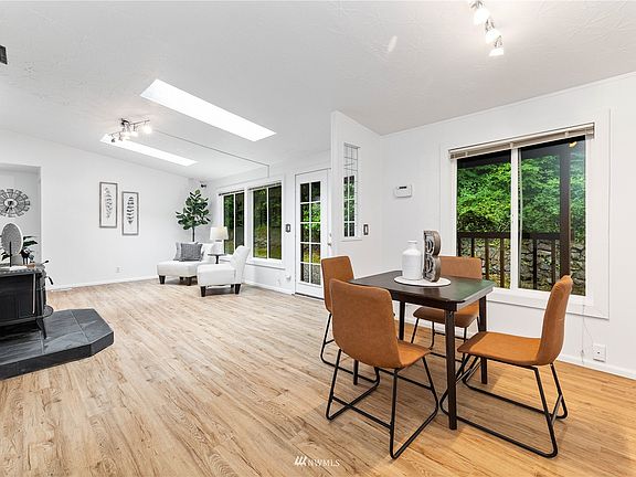 Vermont Castings wood burning fireplace & formal dining room>