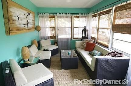 Cozy 3 season porch with gas heater