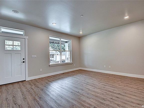 Living room. *photos were taken prior to blinds being installed*