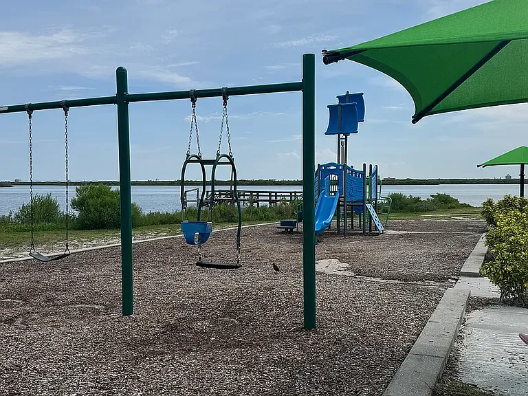 Menard-May Park is less than 1/2 mile from unit. The park has picnic tables, volleyball court, playground, boat/kayak launch, and beautiful swimming area.