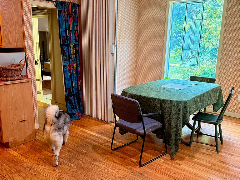 Breakfast nook, showing alternate full bath access.