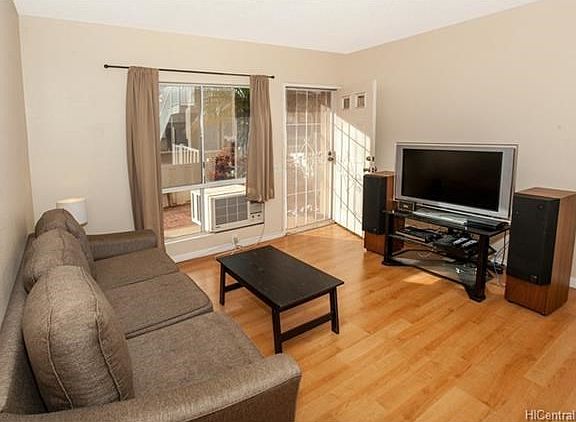 Living area with laminate wood flooring