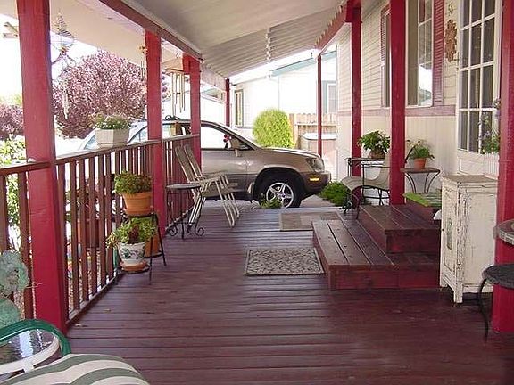 Front deck facing covered 2 car carport