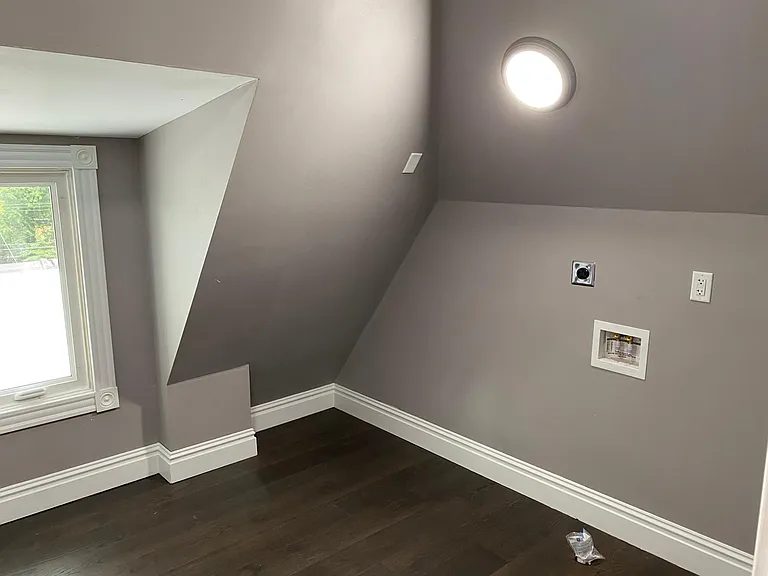 3rd Floor Laundry room off of 3rd floor bathroom. Casement window leading out to rooftop bistro!