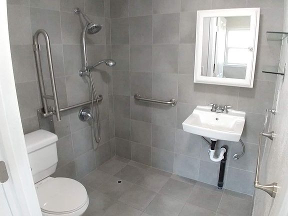 Renovated bath includes two head shower