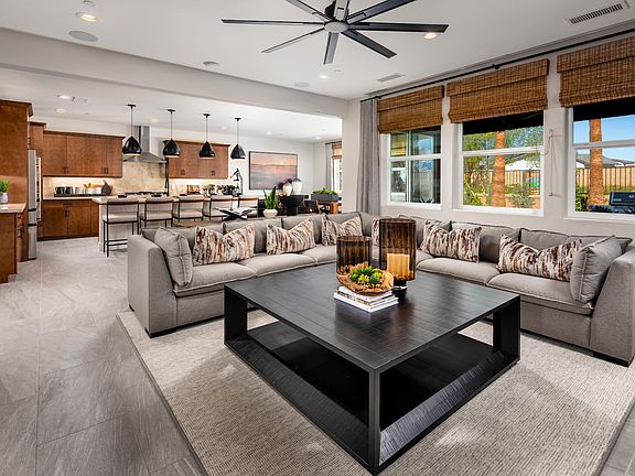 The open floor plan with seamless flow between Great Room, Kitchen and Dining