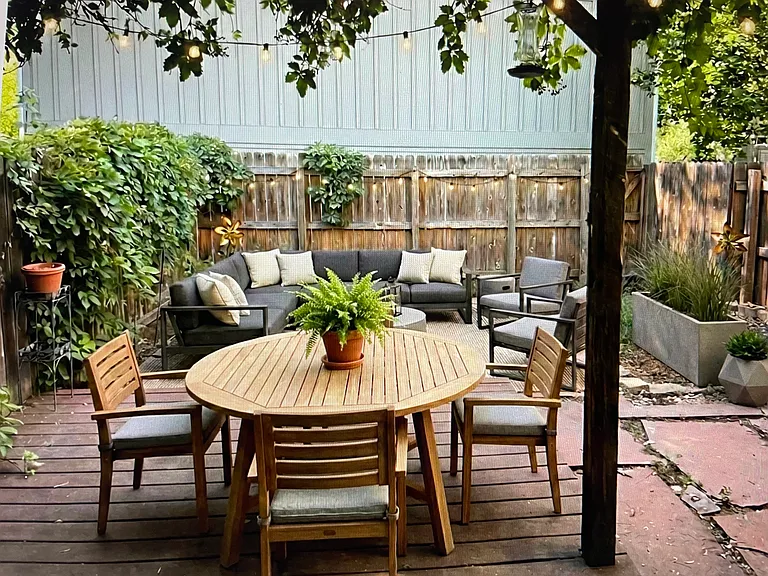 Private fenced backyard virtually staged