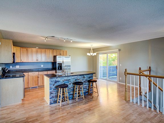 4th image of 6902 Grenwich Ln N