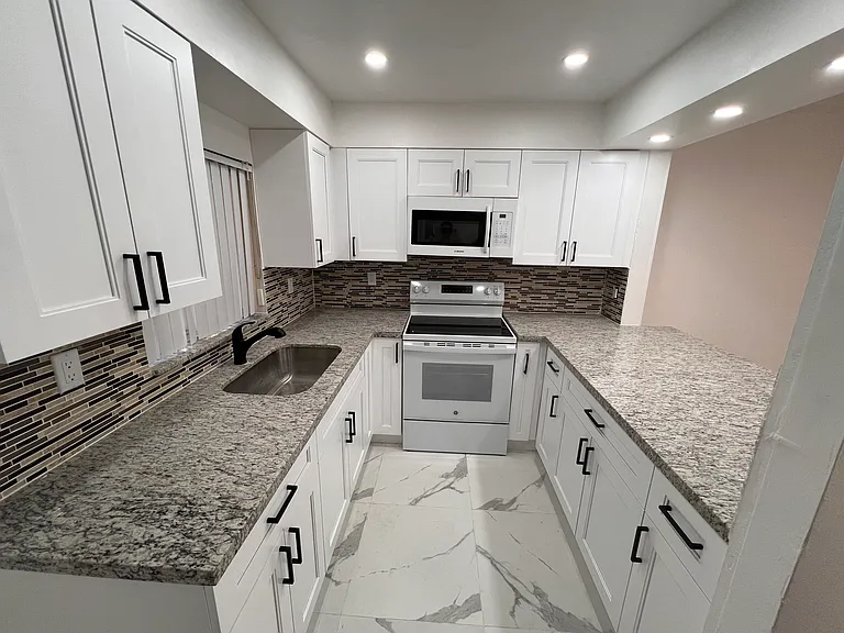 14931 SW 82nd Ter #307 — Photo 1
