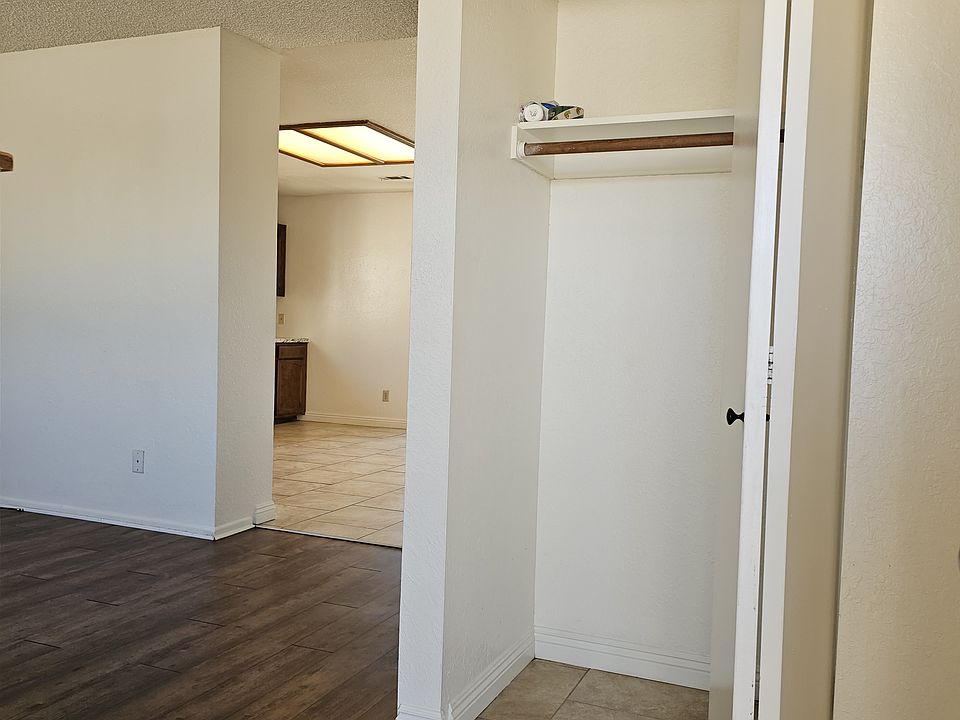 entrance closet for hanging clothes and storage