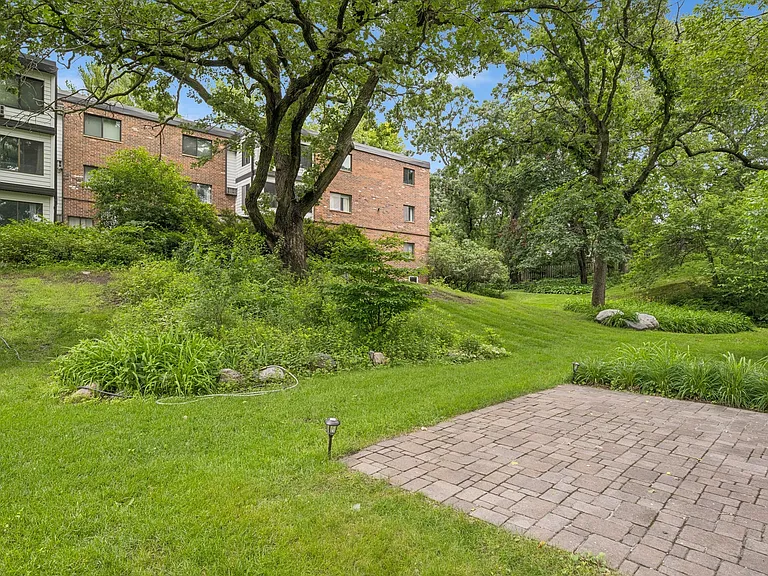 Grounds and exterior shared patio. This shows the south-side of the building