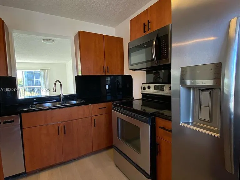 8740 N Sherman Cir #305 — Photo 2
