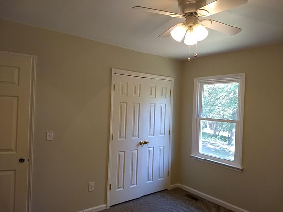Bedroom overlooking backyard