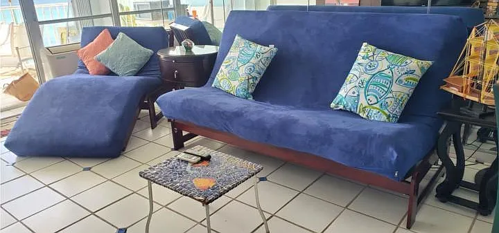 Living room with Queen size futton and Twin size futton/chaise long.