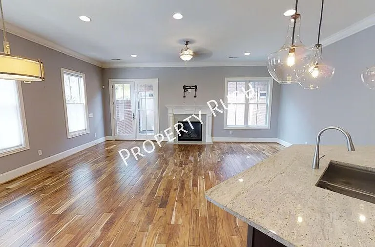 105 E 3rd St — Photo 14