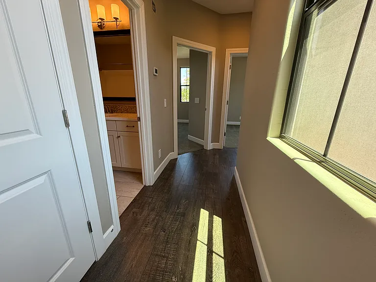 Hallway to 2nd & 3rd bedrooms