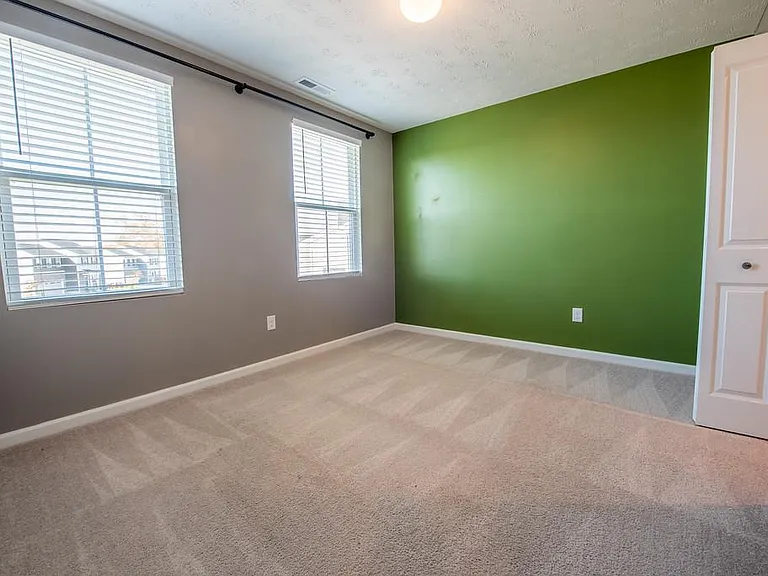 Bedroom 2 Features Double Windows, NEW Light Fixture and Walk In Closet