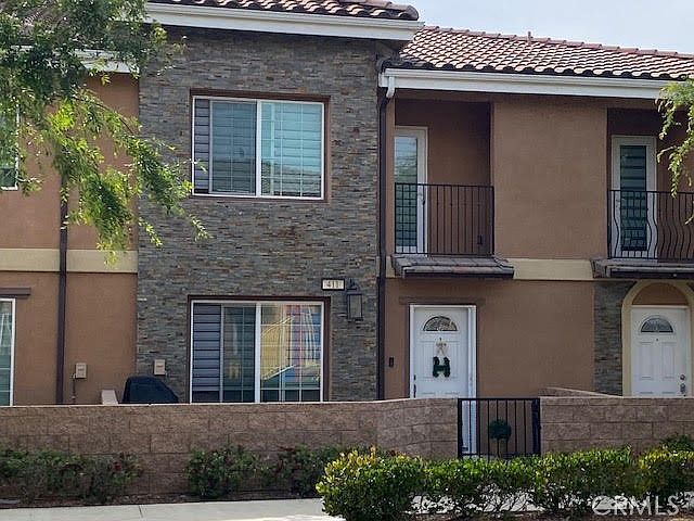 1st image of 16408 Valencia Ave Unit 411