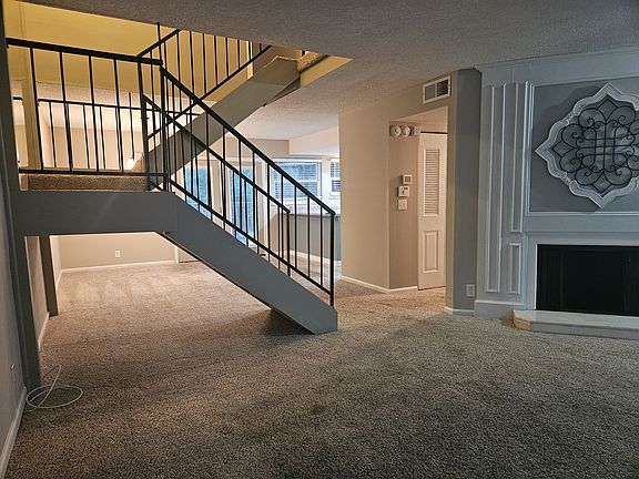 Main living looking into dining room and kitchen.
