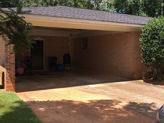 2 vehicle carport w/storage room