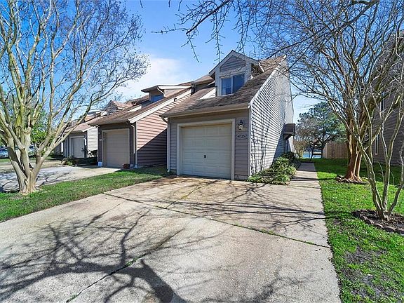Garage, and plenty of parking for 4 cars on larger slab