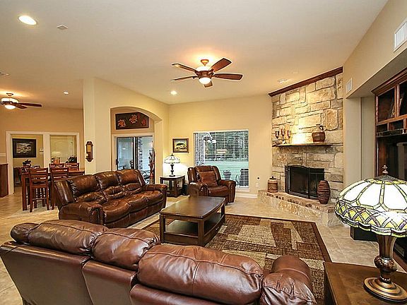 Huge family room with stone fireplace and built ins!