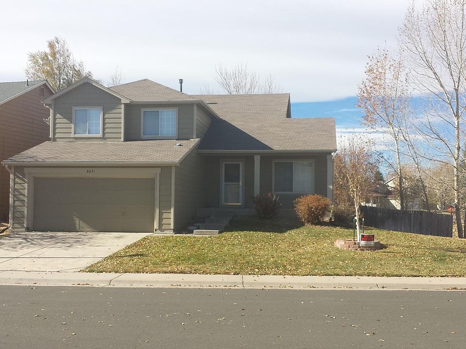 Front View of house; corner lot that backs to open space