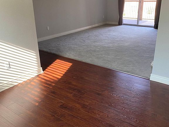 separate dining and living room - direct access to patio from living room
