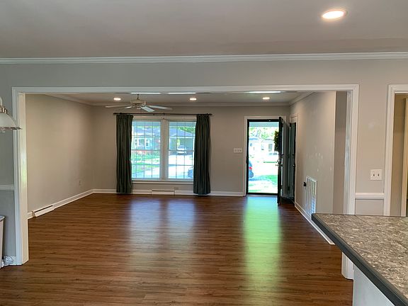 living room and front door from dining area