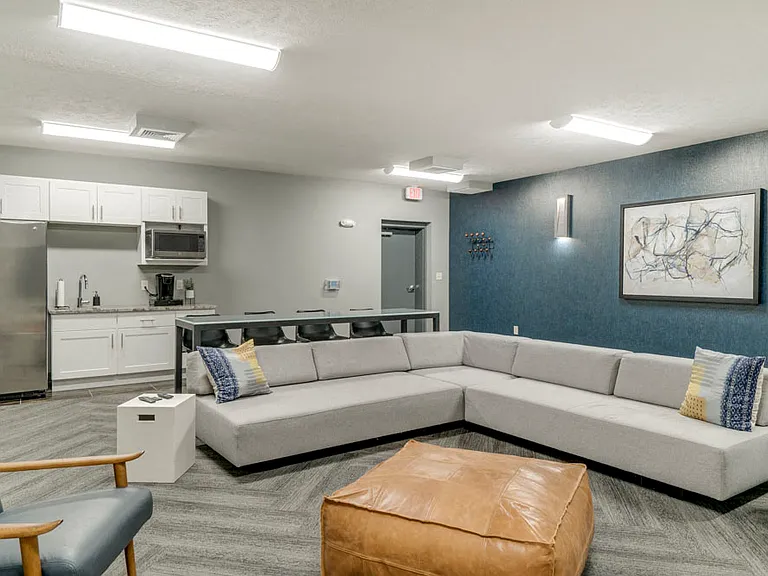 Heat up some popcorn and grab a cold drink from the fridge in the theater room.
