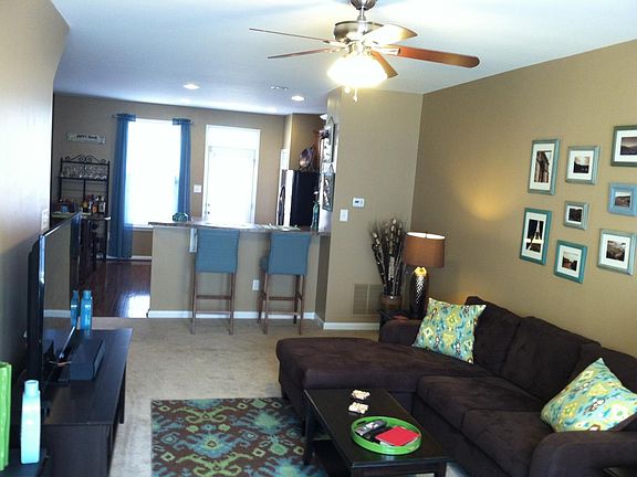 Second Floor: Main living room open to the kitchen and dining area