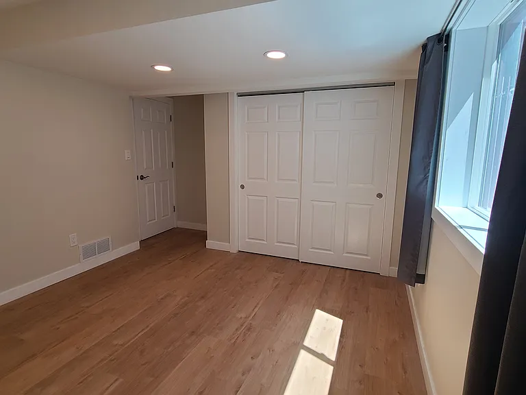 Bedroom 2 closet and entry doorway