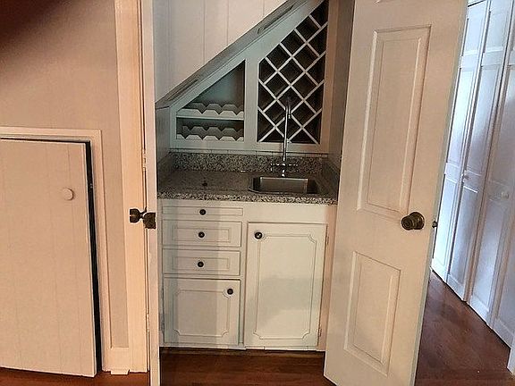 Wine rack and storage in den
