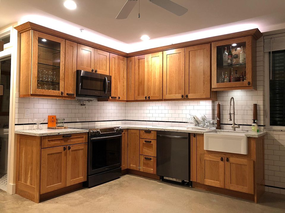 Custom kitchen cabinets, dishwasher, under counter lights