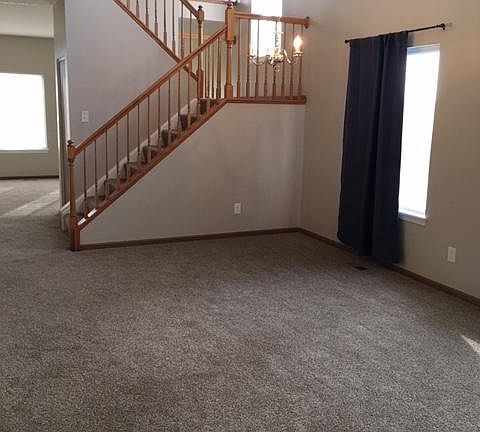 different angle of the living room. lots of natural light.