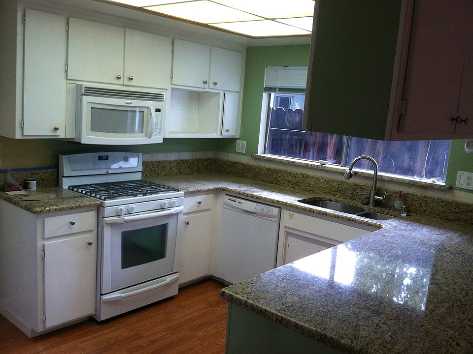 Newly remodeled kitchen with granite counter tops
