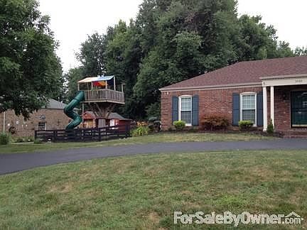 Treehouse
						:
						The famous tree house towers 14' above the fenced-in backyard play area.