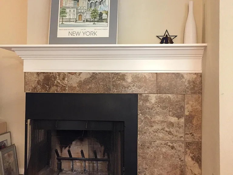 Tile Wood burning fireplace with mantle