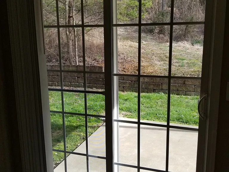 BACK PATIO (GRILLS ALOUD ON CONCRETE AWAY FROM BUILDING)