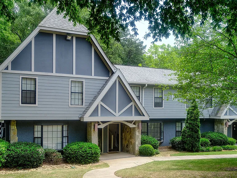 A welcoming community surrounded by greenery and lakeside views
