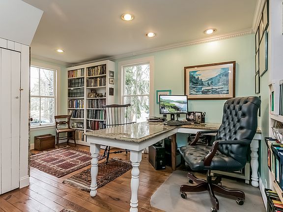 First floor office, or bedroom with built-ins and closet. Full bath just off this room so could be a perfect set-up for guest or master alternative.