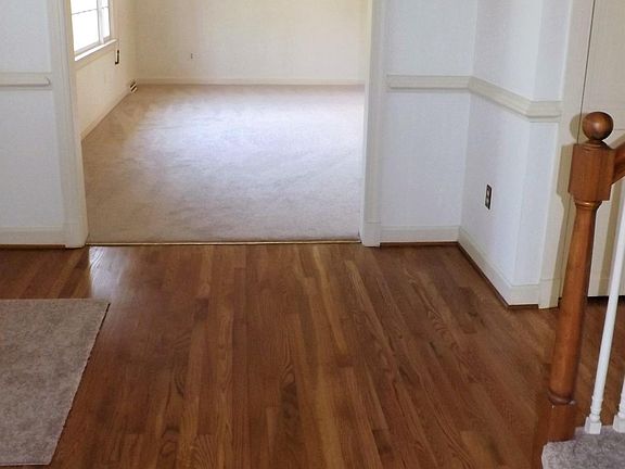 Large Center Hall Foyer with beautiful hardwood floors