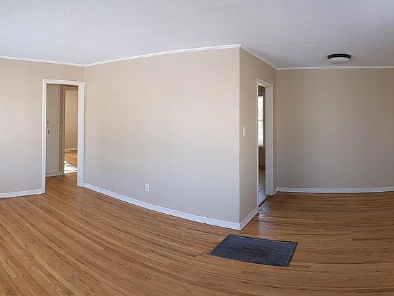 Living room and dining area (panoramic pic)