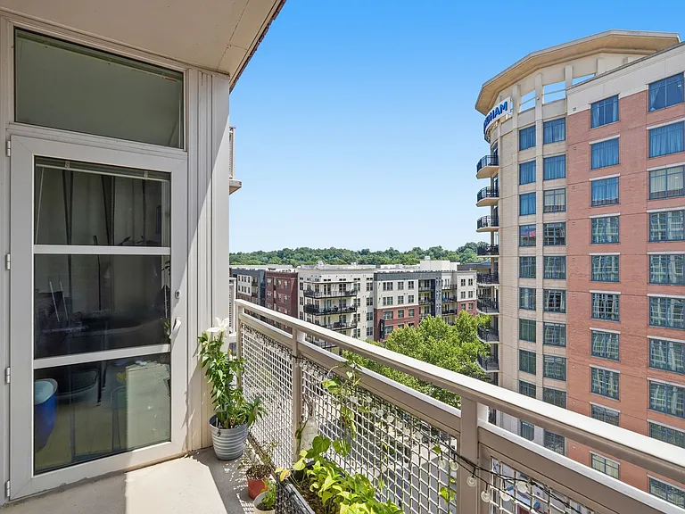 Private outdoor balcony with expansive city views