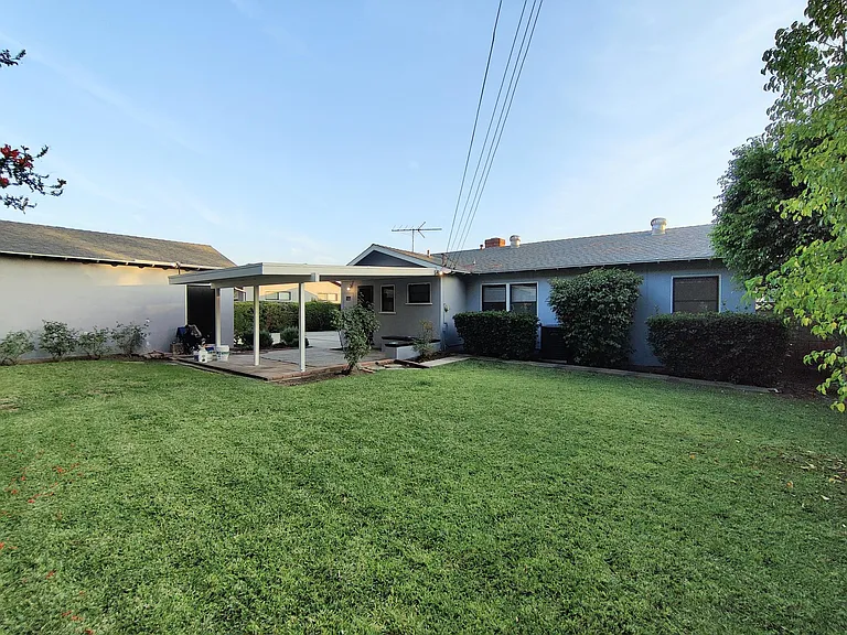 Rear yard and view of back of the house.