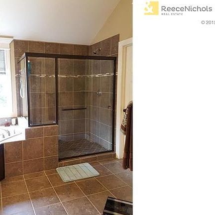 Step into your spacious tiled shower and let the warm water relax & renew you.