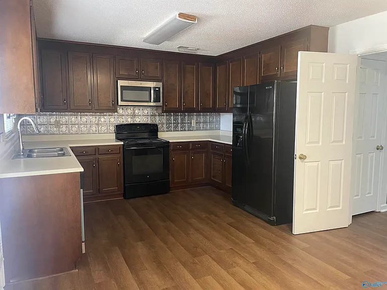 6613 Steeplechase Dr NW — Photo 8